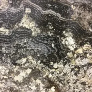 Amarone granite slab with rich burgundy tones for elegant kitchen countertops and interior stone surfaces
