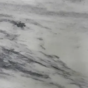 Brazilian Carrara marble slab with soft white background and subtle gray veining ideal for elegant kitchen countertops and interior stone surfaces