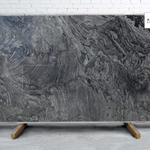 Brilliant Black Polished natural stone surface with deep black background and subtle reflective mineral pattern for luxury kitchen and bathroom countertops