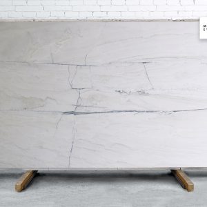 Calacatta Giotto Polished natural stone surface with white background and elegant grey veining for luxury kitchen and bathroom countertops