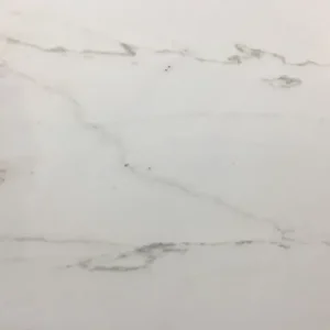 Calacatta Lincoln marble slab with bright white background and dramatic gray veining for luxury countertops and interior stone applications