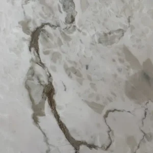Calacatta marble satin finish slab with white background and soft gray veining for elegant kitchen countertops and interior stone surfaces