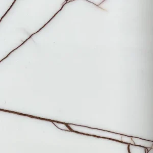 Calacatta Rosso Venato honed marble slab with white base and bold red and gray veining for luxury countertops and wall surfaces