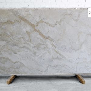 Dolce Vita Polished natural stone surface with soft beige tones and gentle flowing veining for elegant kitchen and bathroom countertops