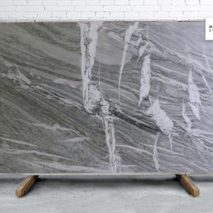 Majestic Nuage Polished natural stone surface with soft grey cloud-like pattern for elegant kitchen and bathroom countertops