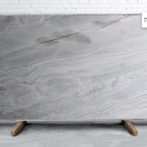 Maldive Polished natural stone surface with light grey tones and soft natural veining for modern kitchen and bathroom countertops