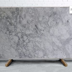 Monte Blanc Polished quartzite surface with soft white background and elegant grey veining for luxury kitchen and bathroom countertops