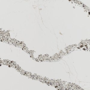 Cambria Annicca quartz countertop slab with white background and bold gray and gold veining for luxury kitchen and bathroom surfaces