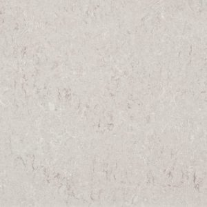 Bianco Drift 6131 quartz countertop slab with bright white base and subtle grey veining for modern kitchen and bathroom surfaces