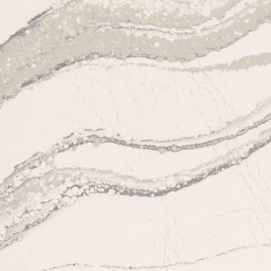 Brittanicca quartz countertop slab with white background and dramatic gray veining for premium kitchen and bathroom surfaces