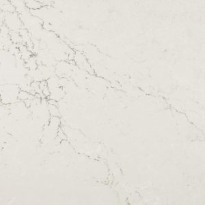 Colton quartz countertop slab with soft white base and subtle gray pattern for modern kitchen and bathroom surfaces
